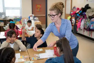 Woman Handing Out Activities to Students